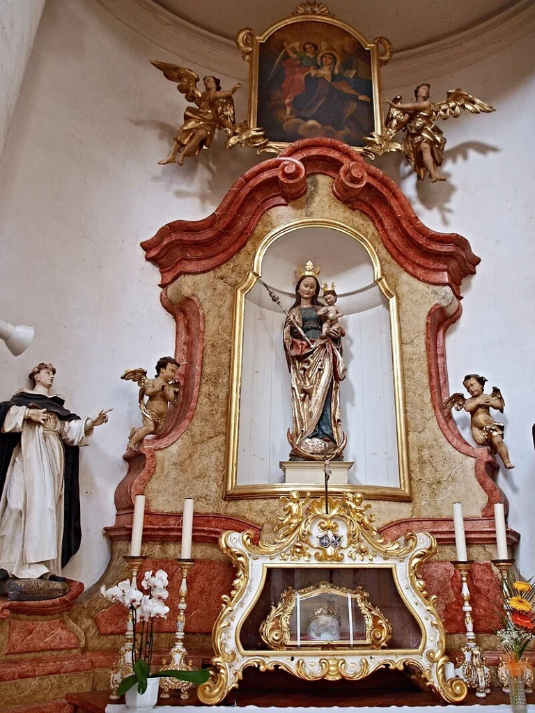 Left side altar with the reliquary of Saint Zdislava inside the basilica